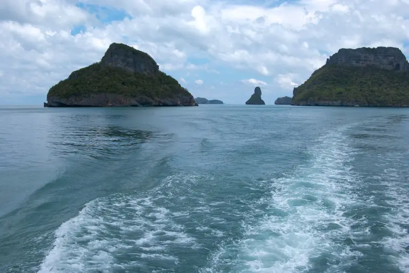 Rocky islands of Ang Thong seen from the stern of a boat