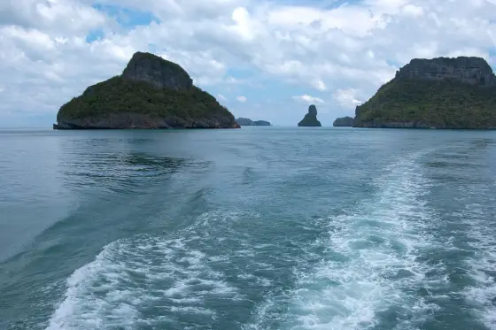 Rocky islands of Ang Thong seen from the stern of a boat