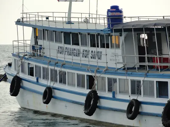 A ferry marked Koh Phangan Koh Samui at the Haad Rin pier