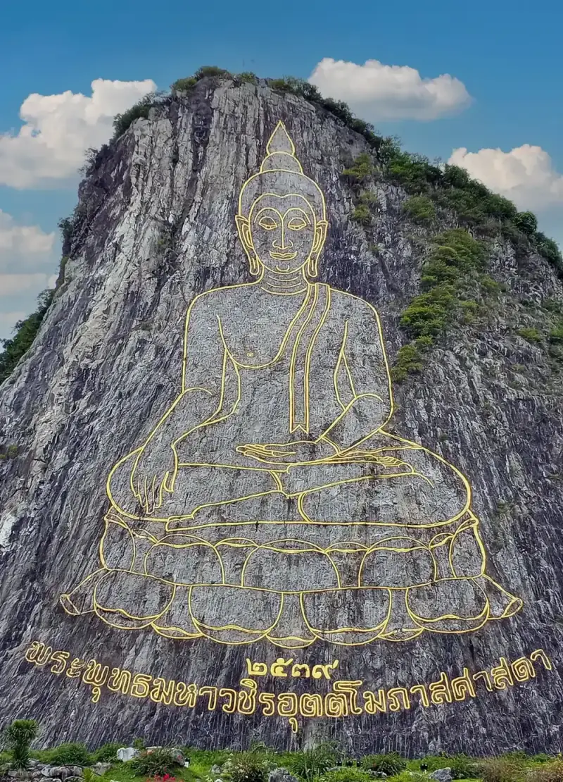Close view of the golden Buddha on a lotus with the inscription and the number 2539