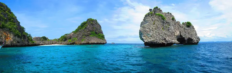 Limestone rocks of the Ko Haa group seen from a boat