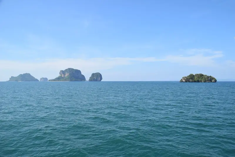Ko Poda and the neighbouring islands on the horizon, seen from a boat