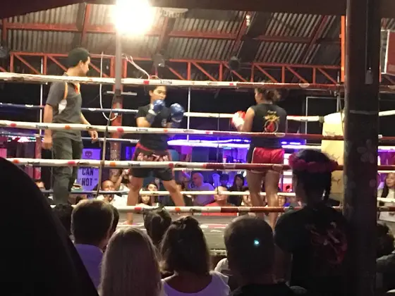 An evening bout at a small stadium in Lamai on Koh Samui, shown for comparison of the format