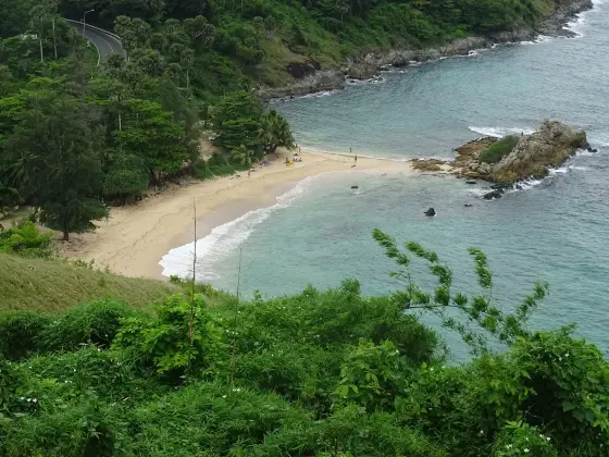 The small Ya Nui beach with a gently sloping sandy entry, seen from above